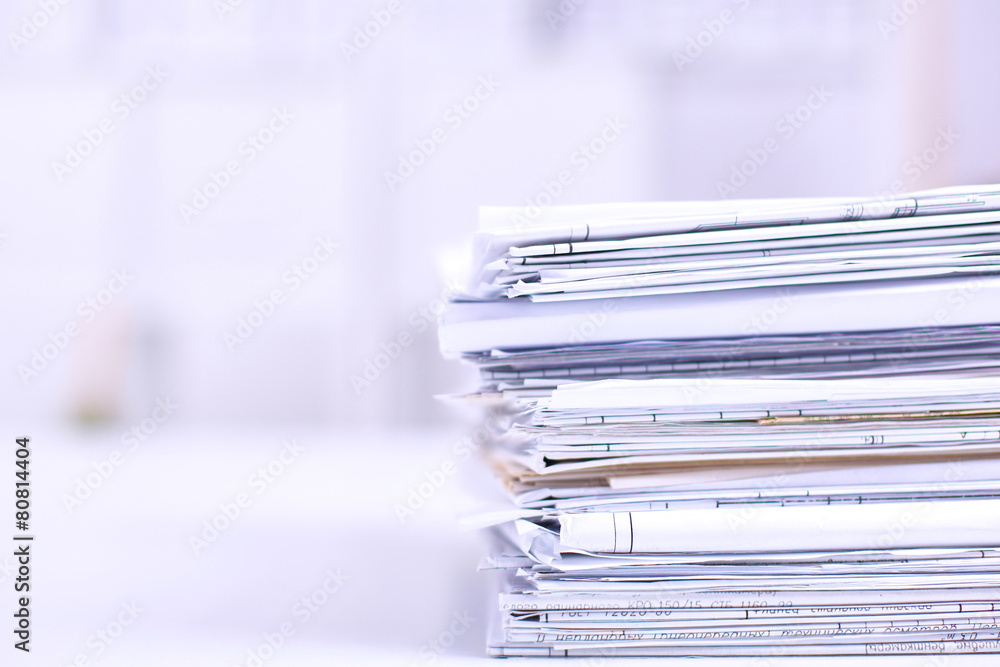 Big stack of papers ,documents on the desk Big stack of papers ,documents on the desk