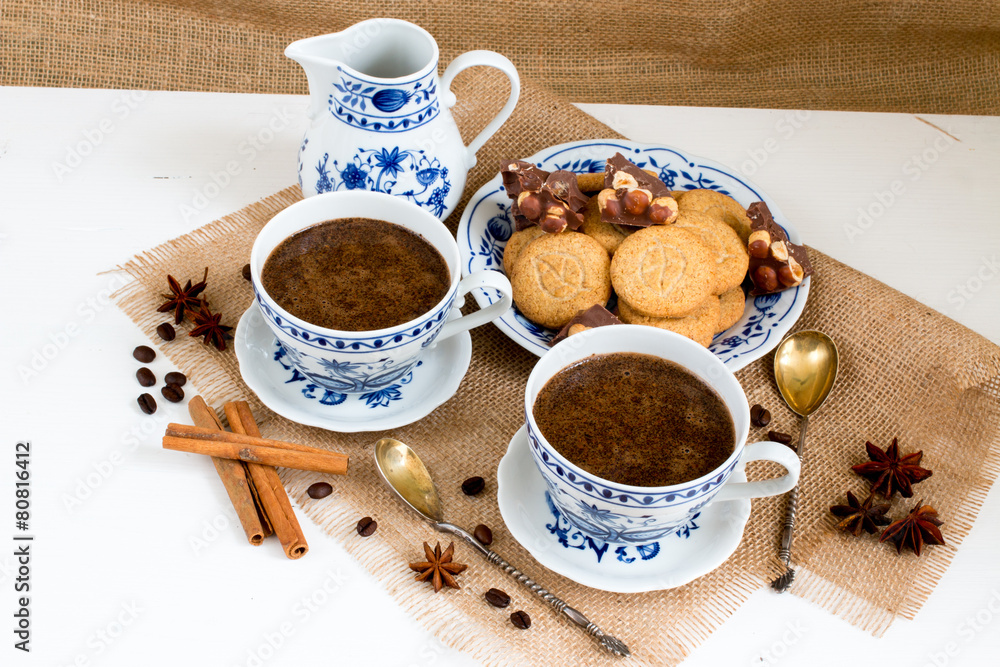 Coffee with sweets. White-blue porcelain. Coffee with sweets. White-blue porcelain.