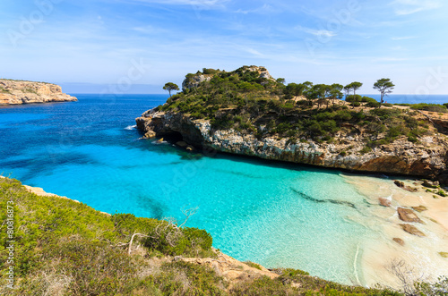 Azure sea water of Cala des Moro beach, Majorca island, Spain © pkazmierczak
