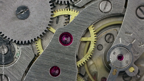 Clockwork of an old mechanical clock close up