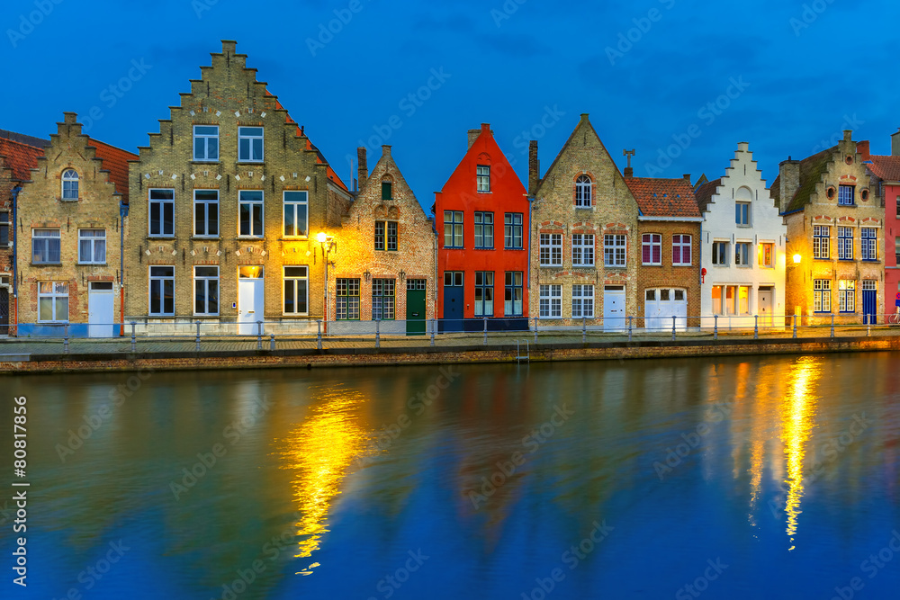 Night Bruges canal with beautiful colored houses