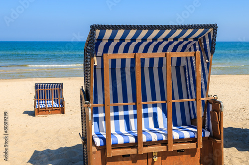 Beach chairs on sandy Baltic Sea beach in Ustka, Poland