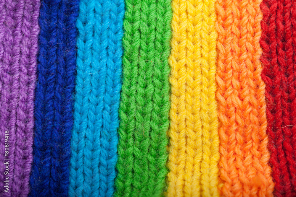 Background from knitted rainbow. texture of wool products. Сomf