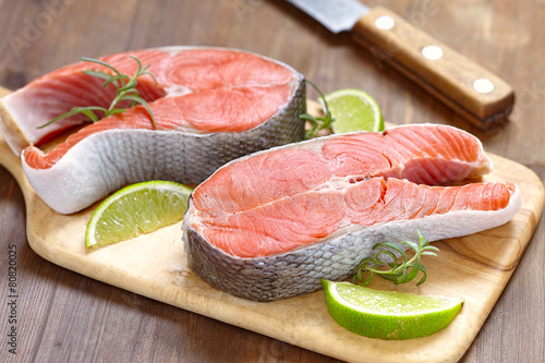 Raw red salmon steaks