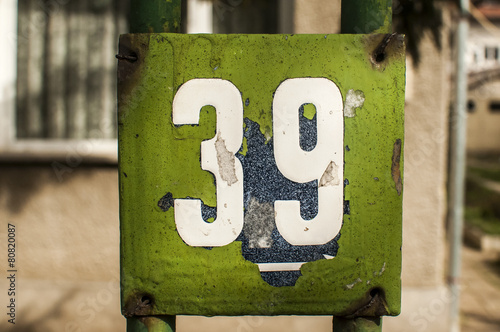 Weathered enameled plate number 39