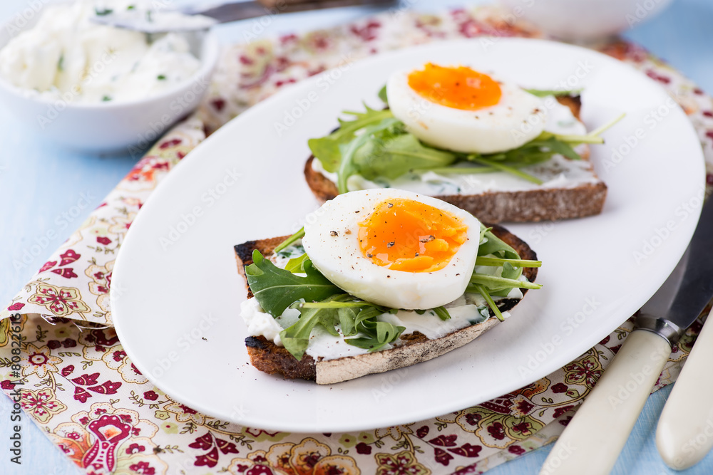 Rye toast sandwiches with egg and soft cheese Rye toast sandwiches with egg and soft cheese
