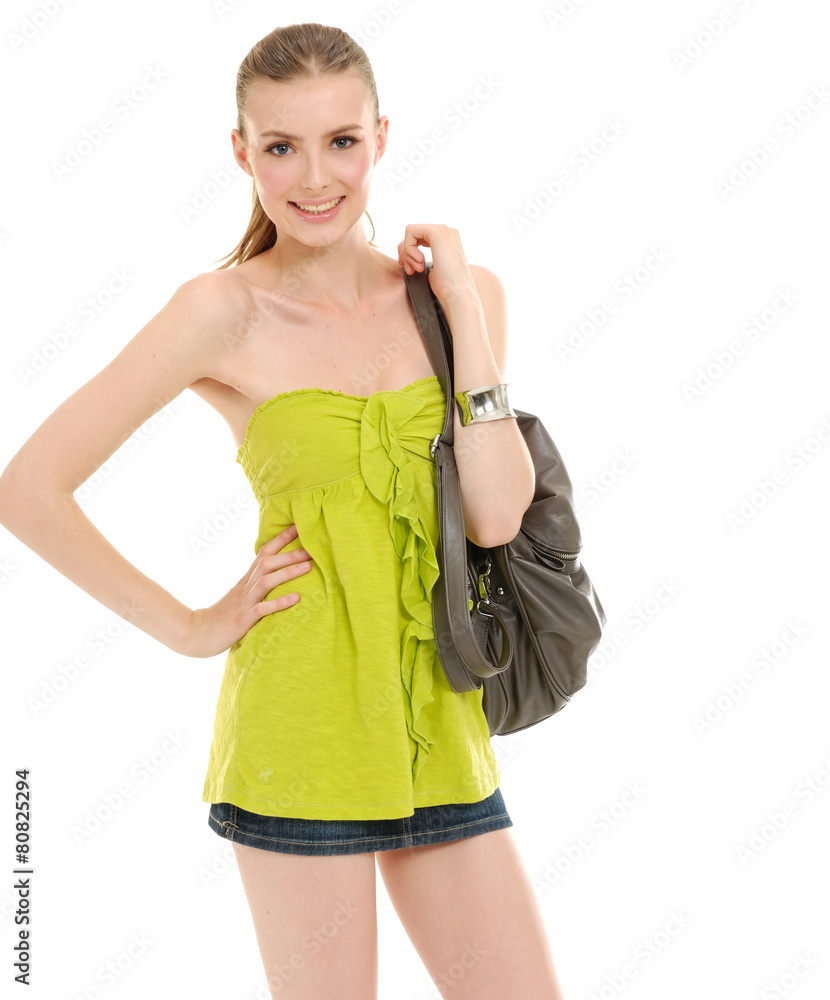 Attractive young girl in casual with bag isolated Attractive young girl in casual with bag isolated
