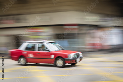 Motion blurred Taxi in Hong Kong.