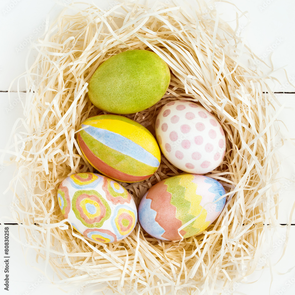 Colorful Easter eggs in nest Colorful Easter eggs in nest
