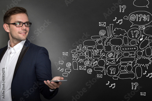 businessman with a cellphone on his hand. buble or speech text