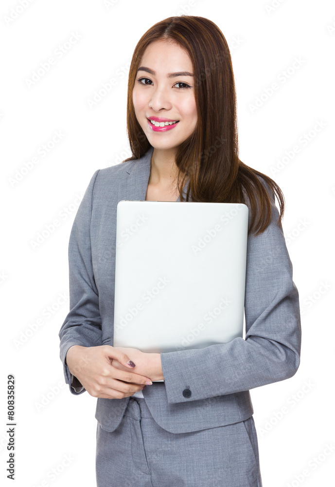 Young asian businesswoman hold with notebook computer Young asian businesswoman hold with notebook computer