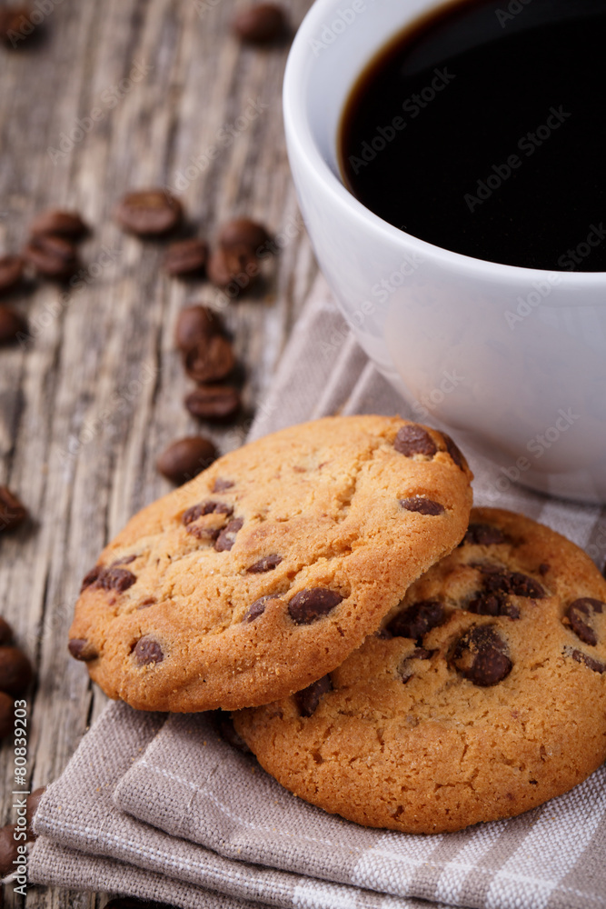 Tasty cookies and coffee cup on a wooden table. Tasty cookies and coffee cup on a wooden table.