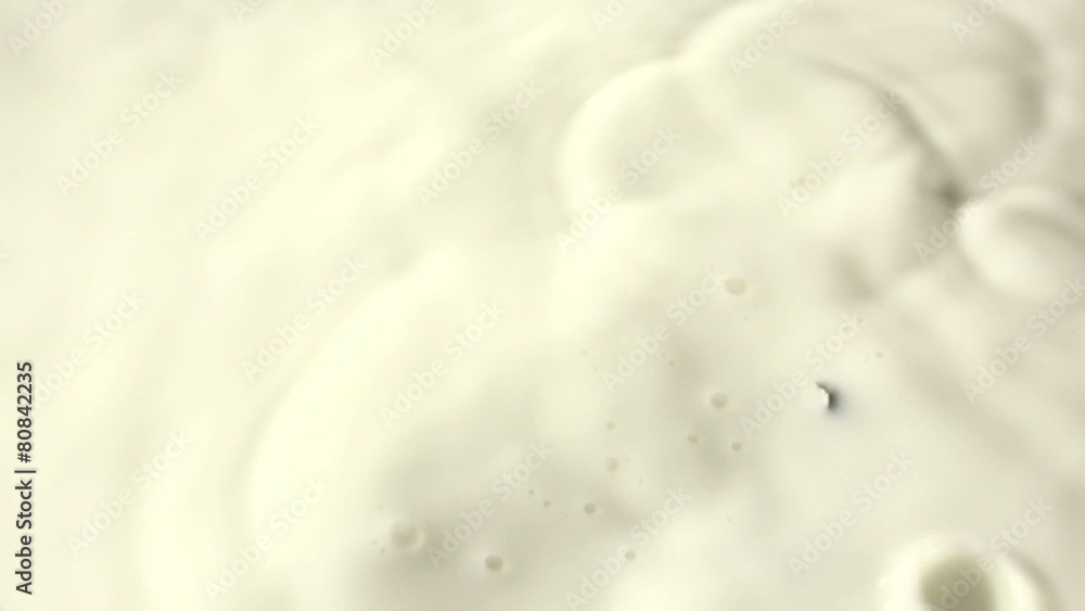 Pouring milk closeup Pouring milk closeup