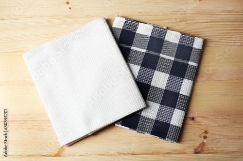 Kitchen towels on wooden background