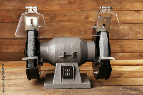 фотографія Knife sharpener on wooden background