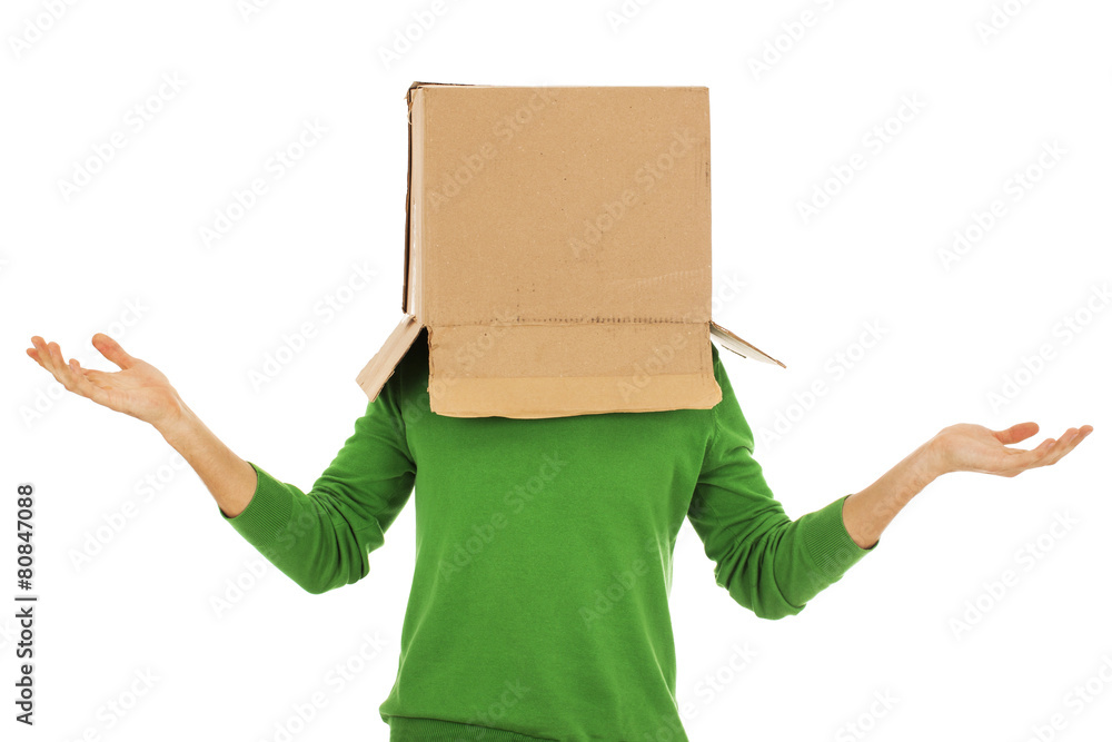 Confused man with cardboard box on his head - Stock Image Confused man with cardboard box on his head - Stock Image
