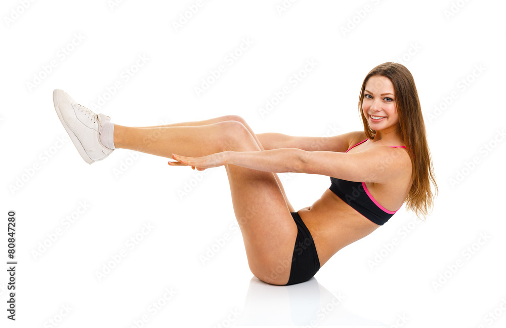 Happy athletic woman doing sport exercise, isolated on white Happy athletic woman doing sport exercise, isolated on white