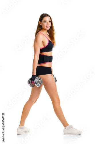 Happy athletic woman with dumbbells doing sport exercise, isolat
