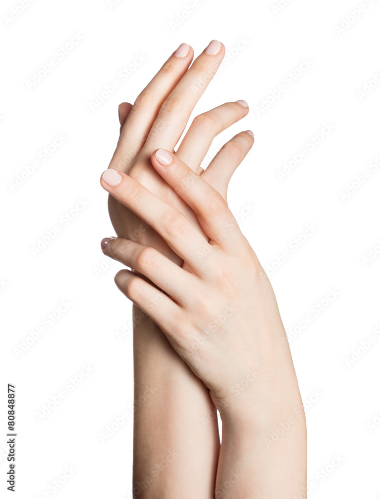 Beautiful woman's hands isolated on white background