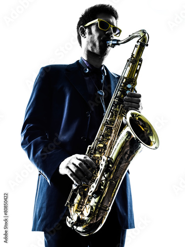 man saxophonist playing saxophone player  silhouette photo