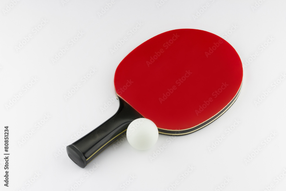 Red table tennis (ping-pong) racket and white ball
