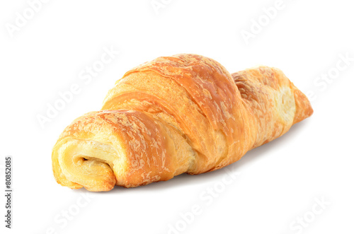 one croissant on a white background