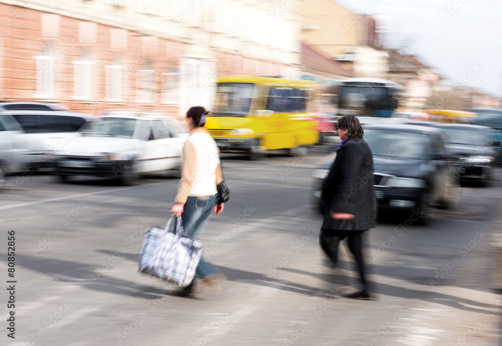 Busy city street people on zebra crossing Busy city street people on zebra crossing