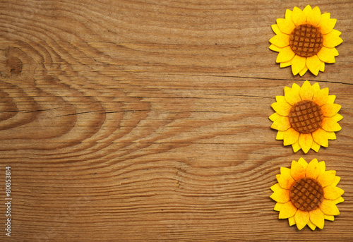 Fototapeta Naklejka Na Ścianę i Meble -  Ornamental sunflowers on wooden background