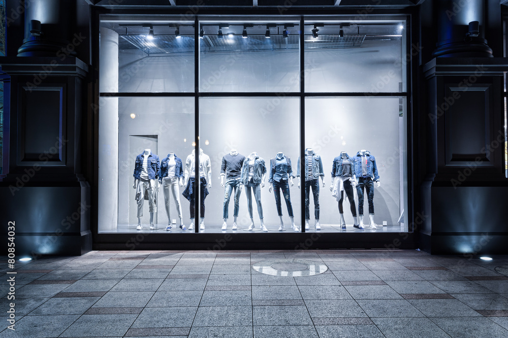 fashion shop display window and clothes. - obrazy, fototapety, plakaty 
