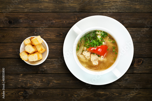 Restaurant food - white fish soup with croutons