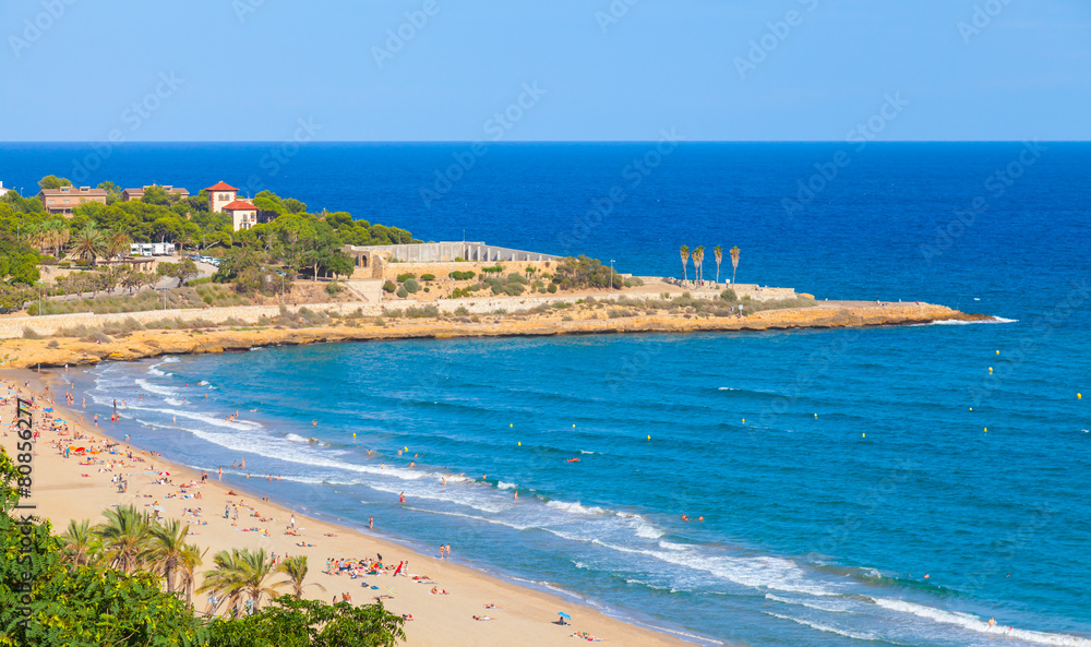 Sandy beach of Tarragona in warm summer day