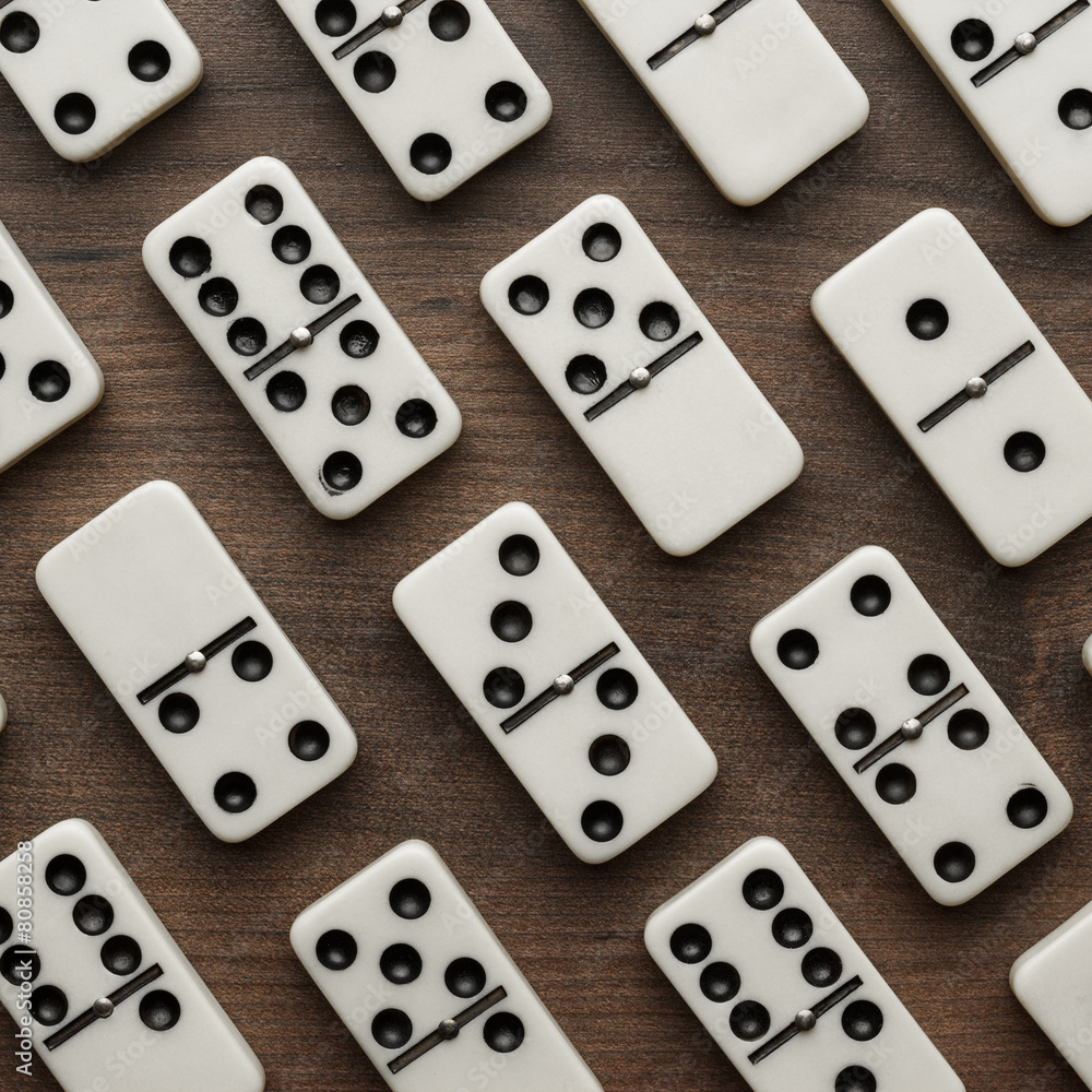 domino pieces on the wooden table background domino pieces on the wooden table background