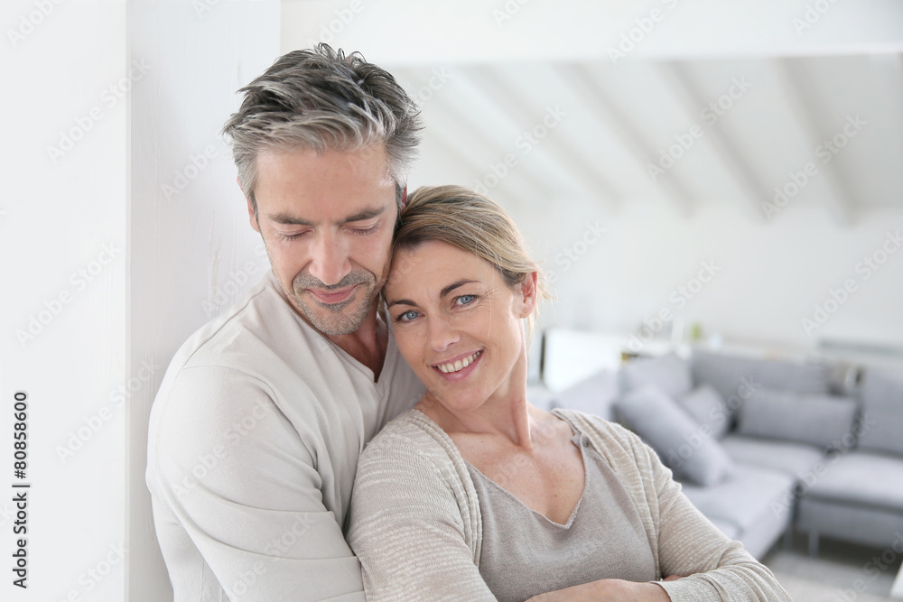 Portrait of mature couple relaxing at home Portrait of mature couple relaxing at home