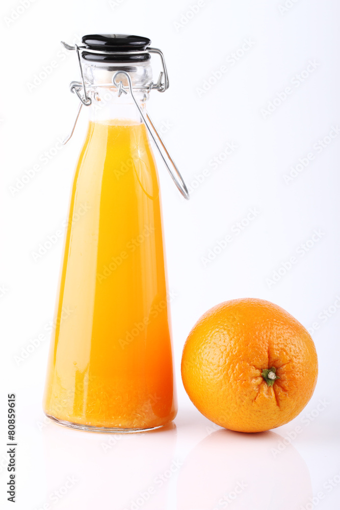 orange and a bottle of orange juice, still life orange and a bottle of orange juice, still life