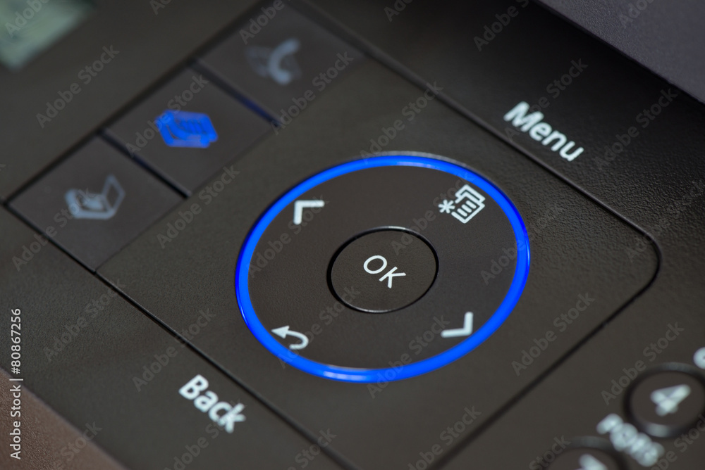 Close up of OK button of a multifunctional device