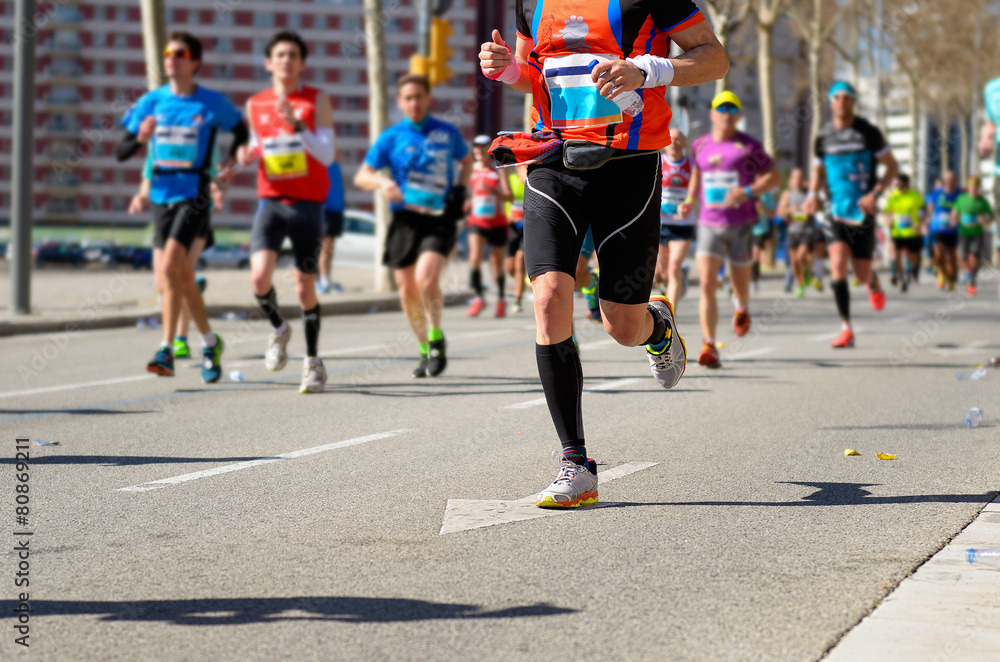 Marathon running race, runners feet on road, sport concept