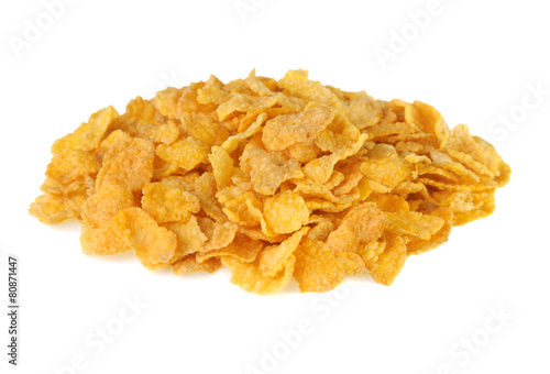 Pile of corn flakes on a white background