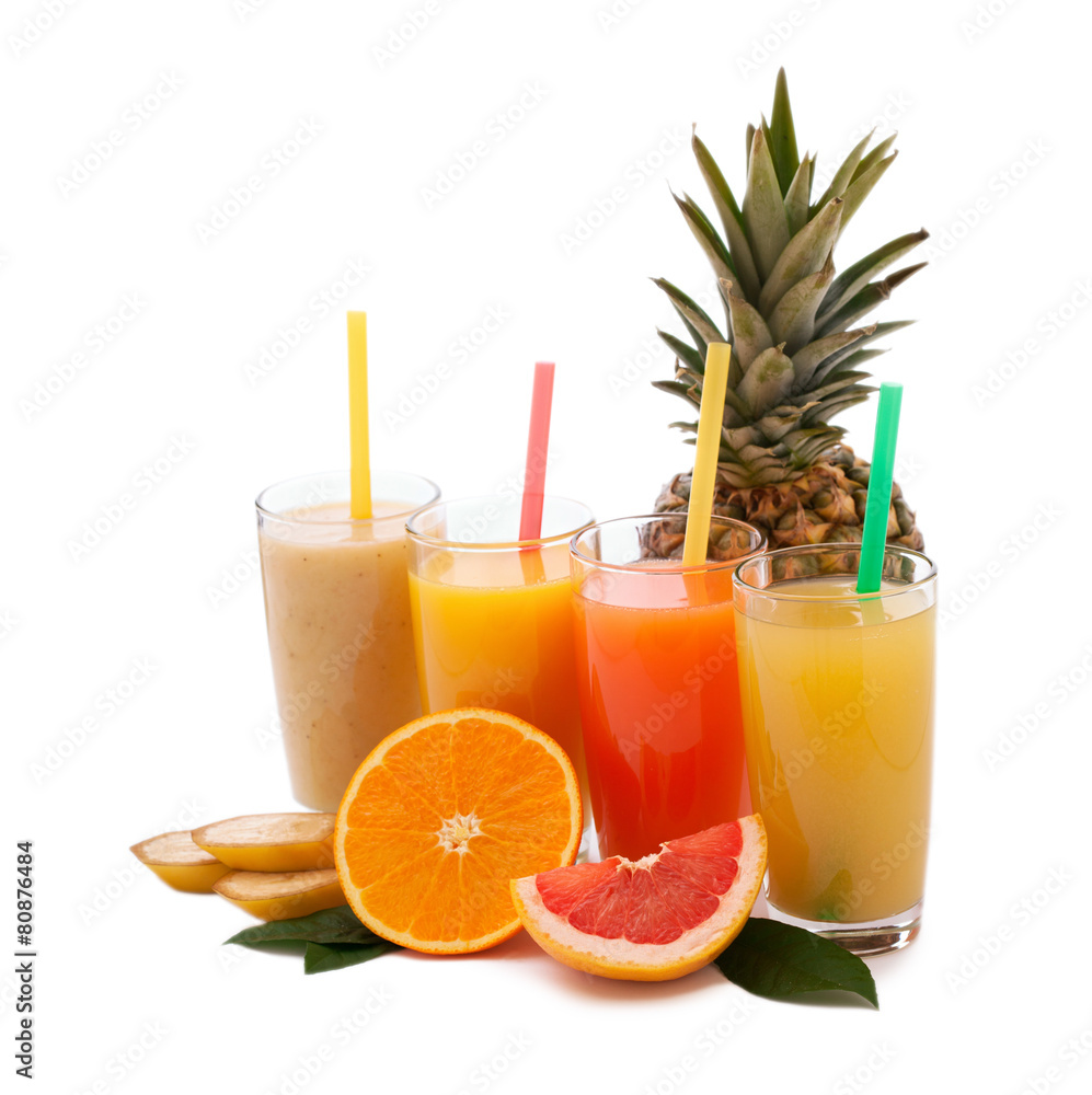 Tropical fruits and juice isolated on white Tropical fruits and juice isolated on white