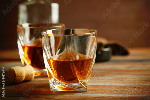 Whiskey on wooden background