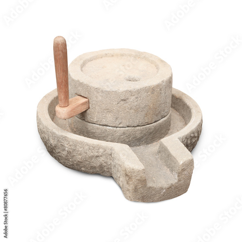 Vászonkép Old manual stone millstones on a white background