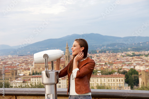 Photos Beautiful girl impressed view the panorama of Florence at sunset