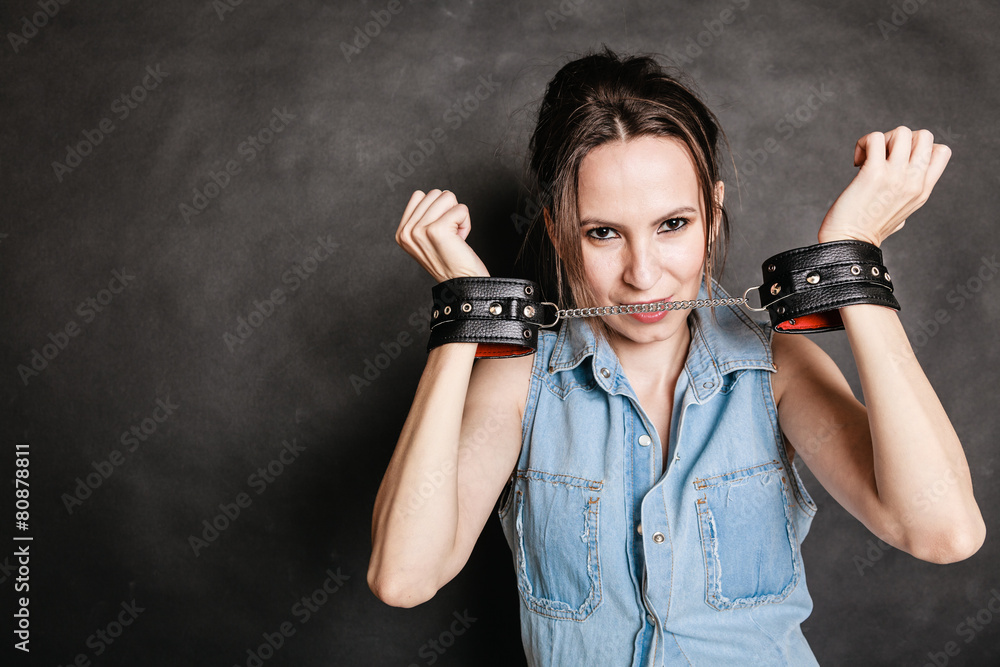 Arrest and jail. Criminal woman prisoner girl in handcuffs Arrest and jail. Criminal woman prisoner girl in handcuffs