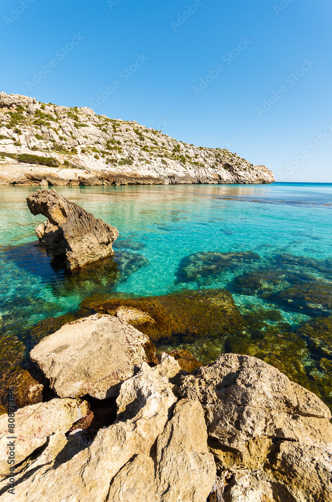Turquoise water of Cala San Vicente beach, Majorca island, Spain