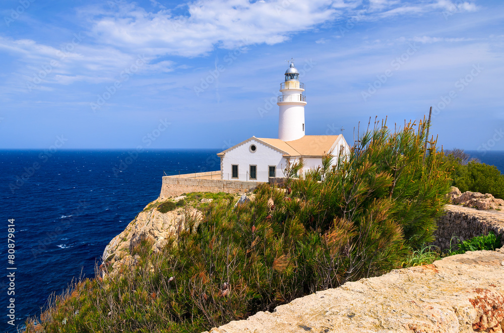 Lighthouse built on cliff in Son Mol, Majorca island, Spain