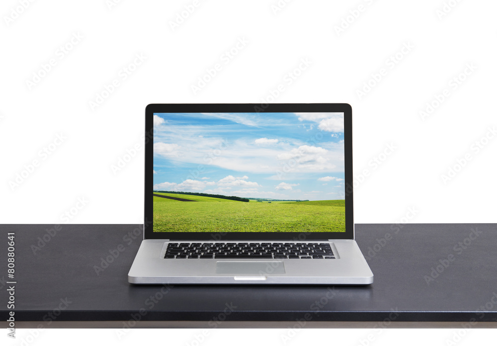 laptop on table over white laptop on table over white