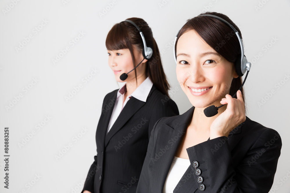 asian businesswomen using headset
