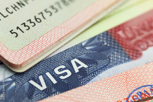 USA visa in a passport background photo