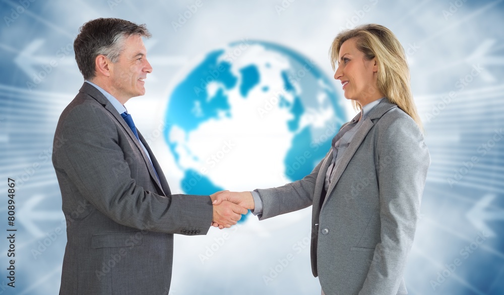 Composite image of business handshake Composite image of business handshake