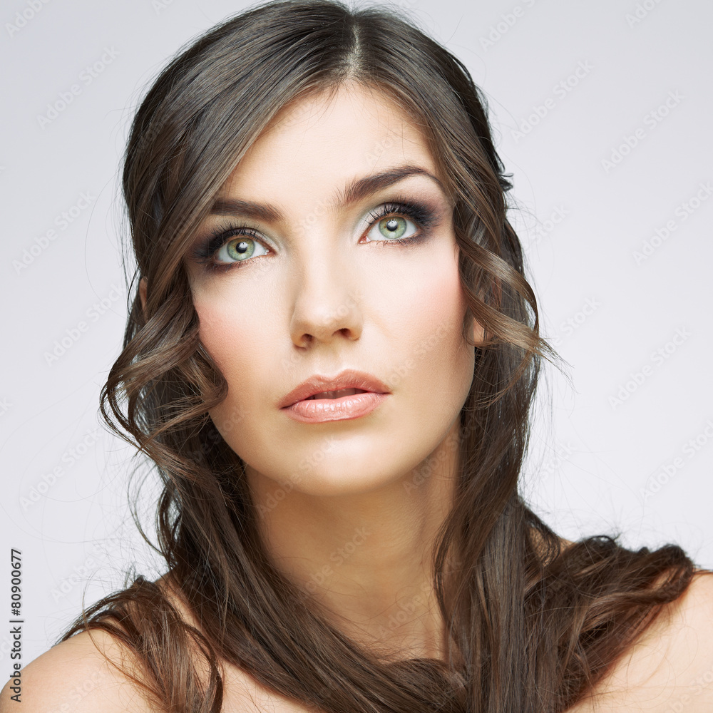 Woman face close up beauty portrait. Girl with long hair lookin Woman face close up beauty portrait. Girl with long hair lookin