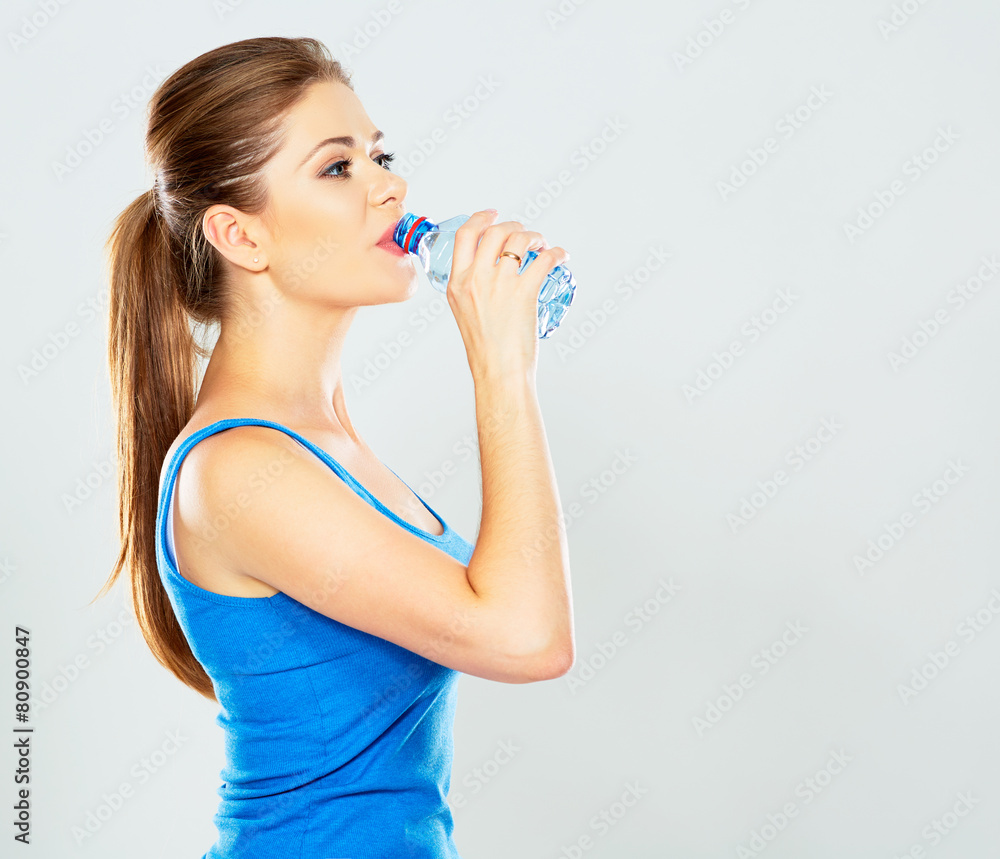 portrait of active woman drinking mineral water of bottle portrait of active woman drinking mineral water of bottle